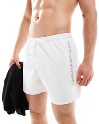 EA7 - Armani - pantaloncini da bagno bianchi con logo laterale verticale - Lyst