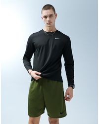 Nike - Miler dri-fit - t-shirt a maniche lunghe nera - Lyst