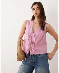 Nobody's Child - Tessa Cotton Rich Sleeveless V-neck Bow Detail Top - Lyst