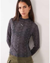PUMA - Snake Printed Mesh Tee - Lyst