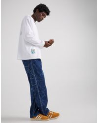 Lee Jeans - X jean-michael basquiat - capsule - jeans dritti lavaggio scuro con motivo artistico - Lyst