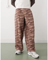 Collusion - Pantalon ultra-bouffant à imprimé camouflage - Lyst