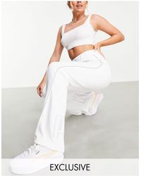 PUMA Icons 2.0 - pantaloni a fondo ampio bianchi - Bianco