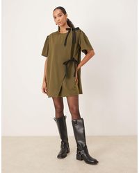 Ghospell - Leighton - robe portefeuille courte à fines rayures - Lyst