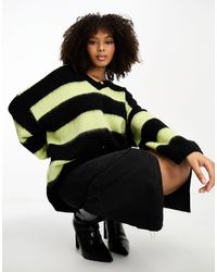 AllSaints - Lou - maglione oversize e verde a righe con scollo a v - Lyst