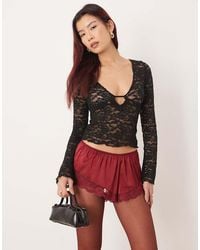 Motel - Mahota Deep Plunge Long Sleeve Lace Top - Lyst
