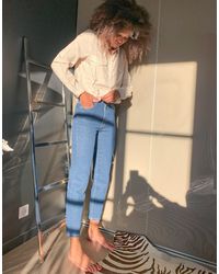 stradivarius mom jean with stretch in washed blue