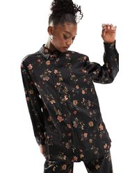 AllSaints - Camisa negra con estampado floral - Lyst