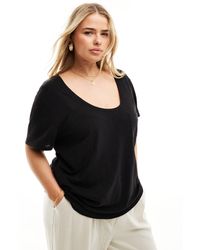 ASOS - Asos design curve - t-shirt nera effetto lino con tasca e scollo rotondo - Lyst