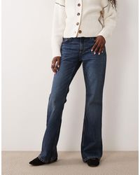 Mango - Trini jean évasé indigo - Lyst