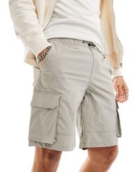 ADPT - Pantalones cortos gris claro cargo técnicos - Lyst