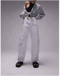 Topshop Unique - Pantaloni a fondo ampio bianchi con linguetta sul retro - Lyst