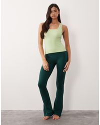 4505 - Seamless Rib Scoop Neck Vest With Racer Back - Lyst