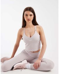 Nike - Metallic Swoosh Vest Top - Lyst