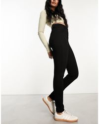 Vero Moda - Vaqueros Negros De Corte Pitillo Y Talle Muy Alto De - Lyst