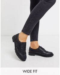 dr martens serova black embroidered chunky flatform shoes