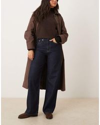 ARKET - Vaqueros De Talle Alto Y Pernera Holgada Con Lavado Azul Añil Oscuro Enjuagado Coral De -Azul Marino - Lyst