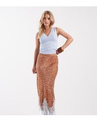 Never Fully Dressed - Petite Maeva Satin Maxi Skirt With Lace Trim Hem - Lyst