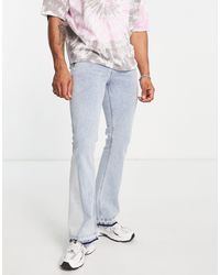 ASOS - Jeans a zampa elasticizzato lavaggio chiaro con pannello laterale e dettaglio sul fondo - Lyst