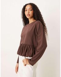 ASOS - Bubble Peplum Hem Long Sleeve Top - Lyst
