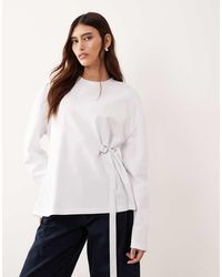 ARRANGE - Side Buckle Long Sleeve Tee - Lyst