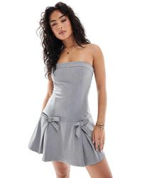 Glamorous - Strapless Pleated Bow Mini Dress - Lyst