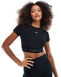 Nike - Nike - pro - t-shirt crop top - Lyst