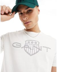 GANT - T-shirt bianca con logo dello scudo - Lyst