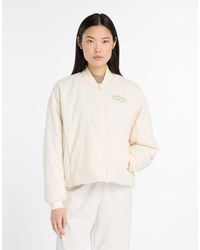 New Balance - Linear Heritage Woven Bomber Jacket - Lyst