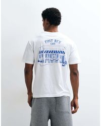 PUMA - Graphic Cafe Relaxed Tee - Lyst