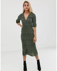 asos design plisse high neck balloon sleeve open back midi dress