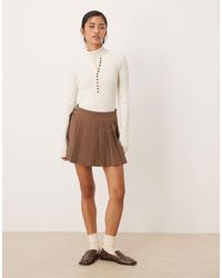 Mango - – eleganter mini-faltenrock - Lyst