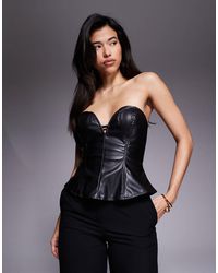 AFRM - Leather Look Sweetheart Neck Peplum Corset - Lyst