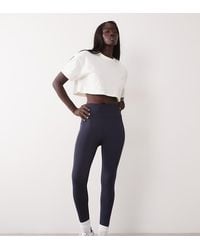 4505 - Tall Icon Active Tie Waist Run legging With Phone Pocket - Lyst