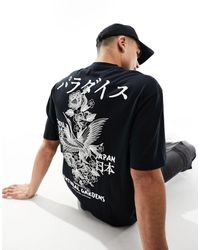 ASOS - T-shirt oversize nera con stampa floreale stile souvenir sul petto e sul retro - Lyst