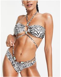 River Island - Top bikini a fascia con perline - Lyst