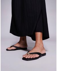 South Beach - – zehenstegsandalen aus bast - Lyst
