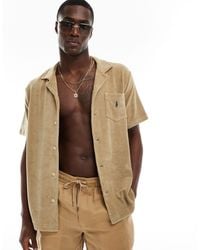 Polo Ralph Lauren - Chemise en coton éponge légère avec poche à logo emblématique avec col à revers - beige - Lyst