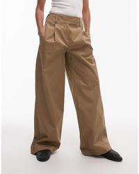 TOPSHOP - Pantalon ample chino habillé à pinces et taille haute - sable - Lyst