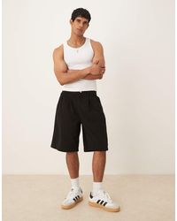 ASOS - Pantaloncini Taglio Lungo Neri Con Pieghe Doppie - Lyst