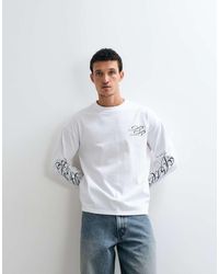 Weekday - T-Shirt A Maniche Lunghe Oversize Bianca Con Stampa Grafica Di Battiti Spezzati - Lyst