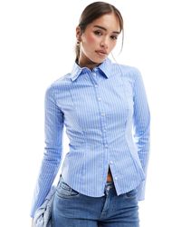 Bershka - – figurbetonte hemdbluse mit en streifen - Lyst
