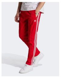 adidas Originals - Adicolor classics beckenbauer - pantaloni della tuta rossi - Lyst