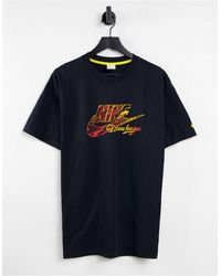 Nike World Tour Pack Graphic Oversized T-shirt in Black for Men | Lyst  Canada