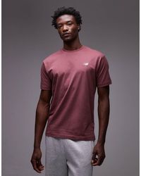 New Balance - Camiseta Burdeos Lavado De Algodón Sport Essentials De -Rojo - Lyst