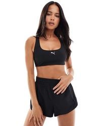 PUMA - 4keeps Athlete Sports Bra - Lyst