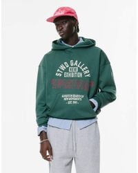 Pull&Bear - Felpa Bottiglia Con Cappuccio E Stampa Stwd Gallery - Lyst