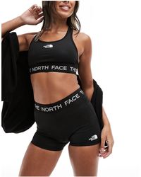 The North Face - Pantalones cortos s supercortos con logo tech - Lyst