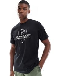 Nike - T-shirt en tissu dri-fit à logo graphique métallisé - Lyst