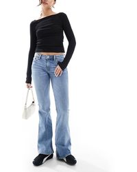 Monki - Vaqueros De Campana Azules De Corte Bootcut Y Talle Bajo Con Lavado Envejecido Katsumi De - Lyst